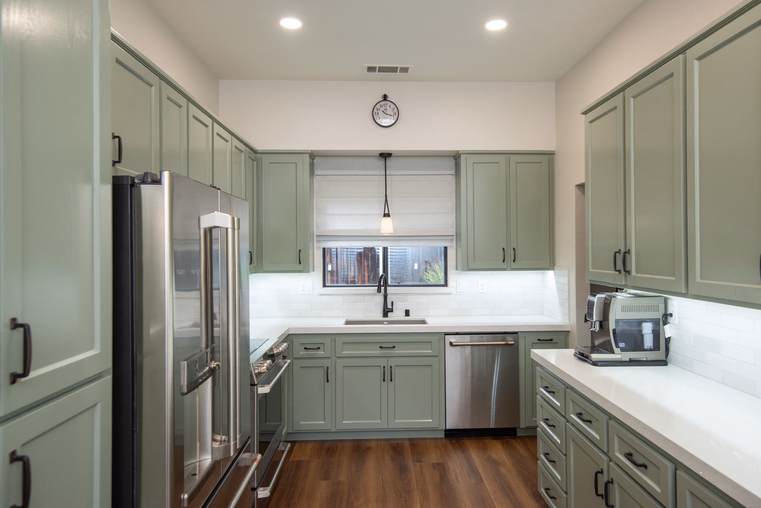 Kitchen remodel in Tracy by kitchen & bath CRATE – cabinets, appliances, countertops, backsplash, flooring, vinyl plank, lighting