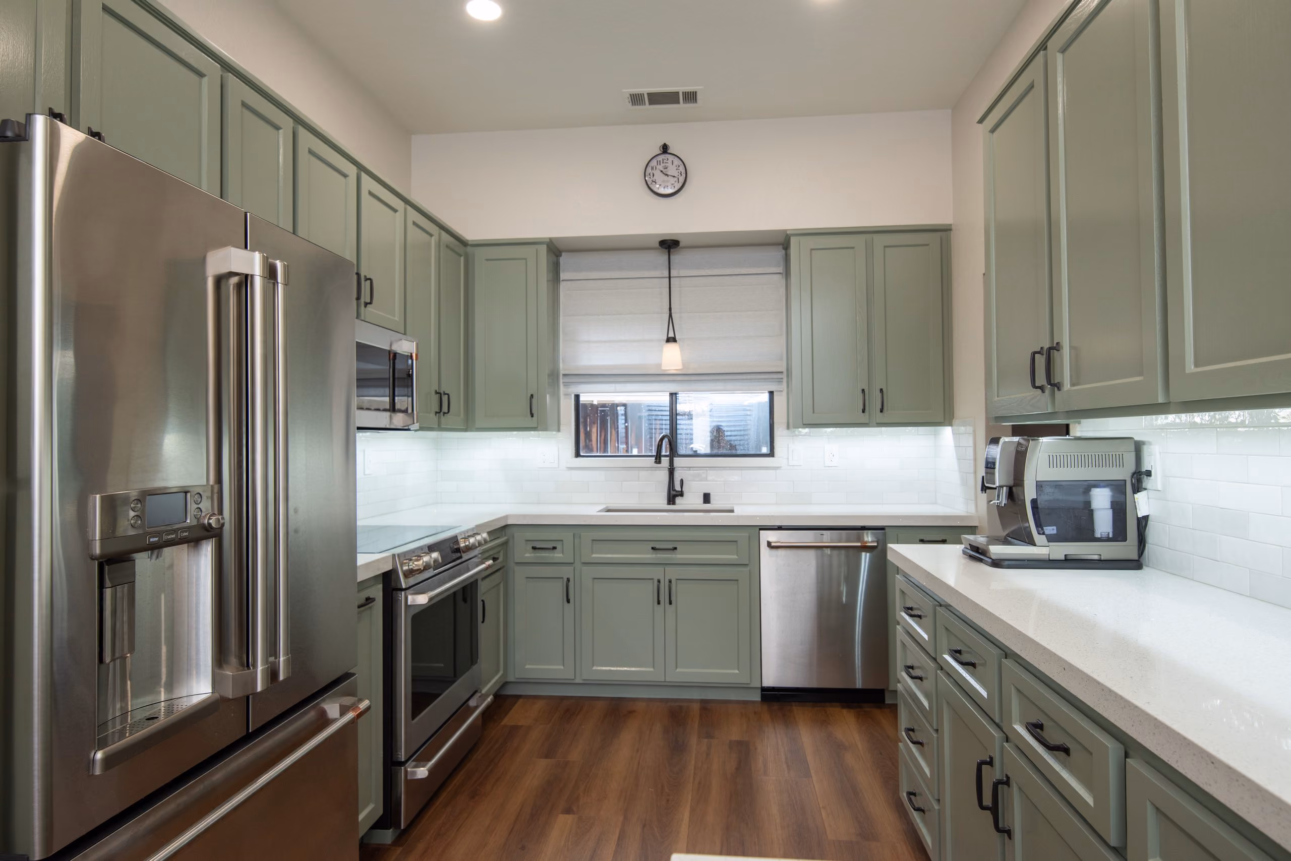 Kitchen remodel in Tracy by kitchen & bath CRATE – cabinets, appliances, countertops, backsplash, flooring, vinyl plank
