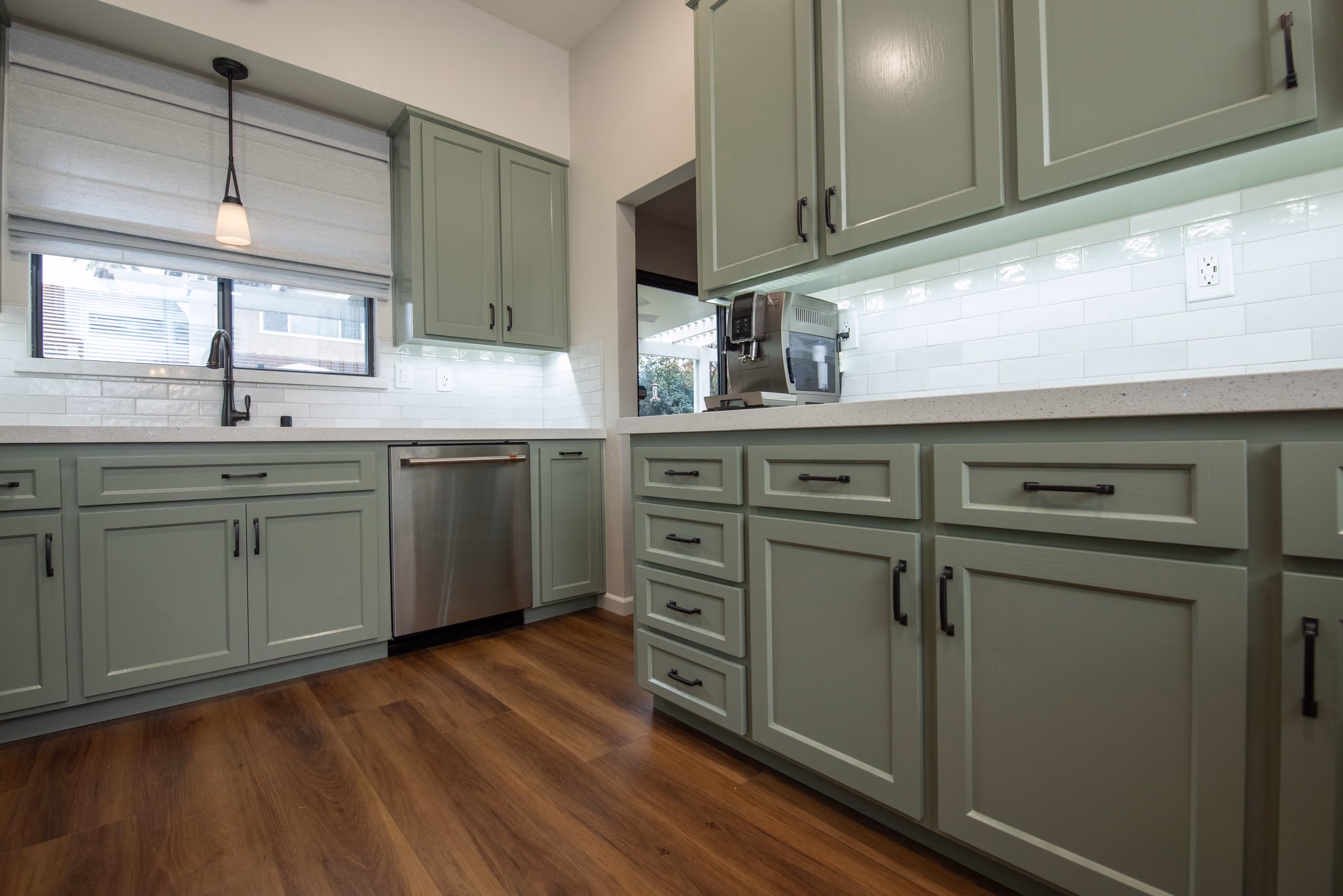 Kitchen remodel in Tracy by kitchen & bath CRATE – cabinets, countertops, backsplash, appliances, flooring, vinyl plank, lighting