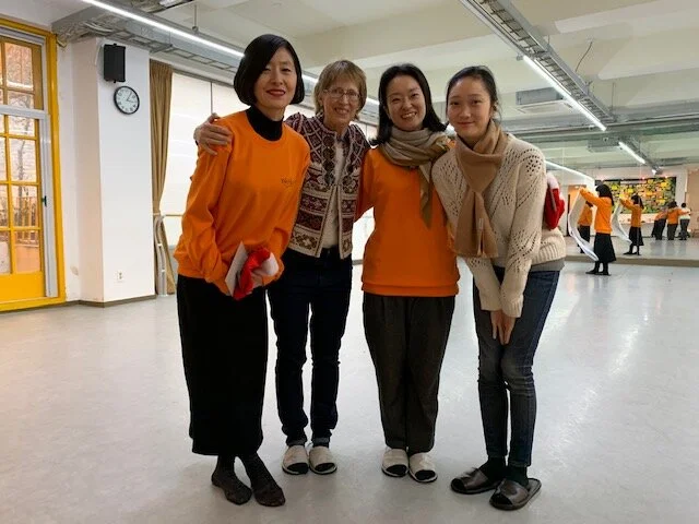 Pam with Mun Ghy Min, Director of the DCDC, and her staff