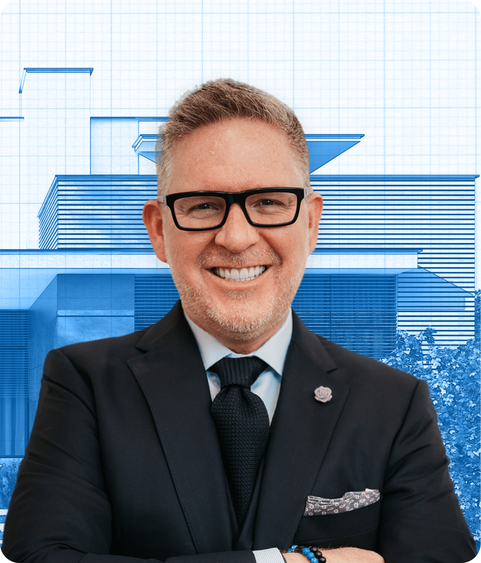 A headshot of Tom Ferry in front of a house.