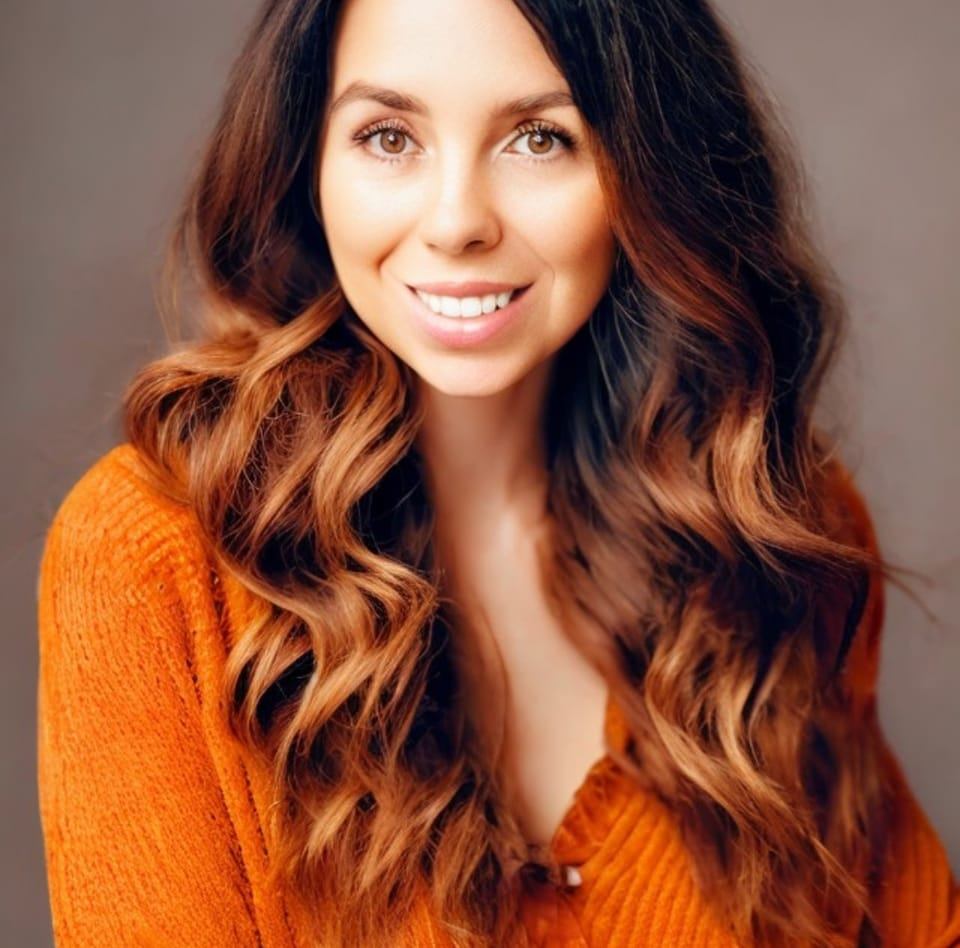 A headshot of a broker and Realtor from eXp Realty.