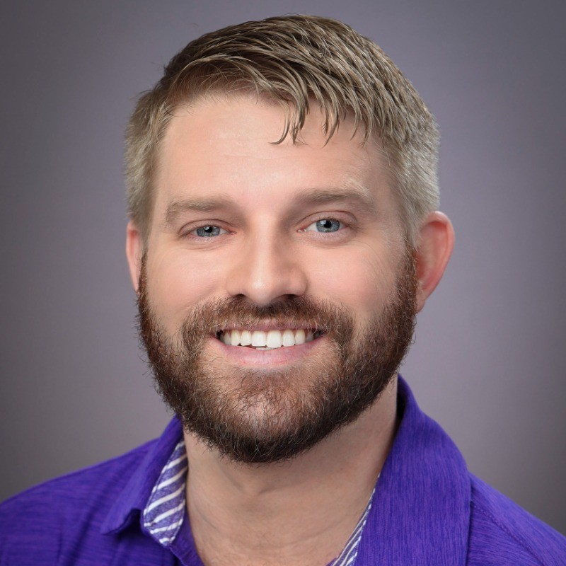A headshot of a broker and owner of Holley Homes Realty