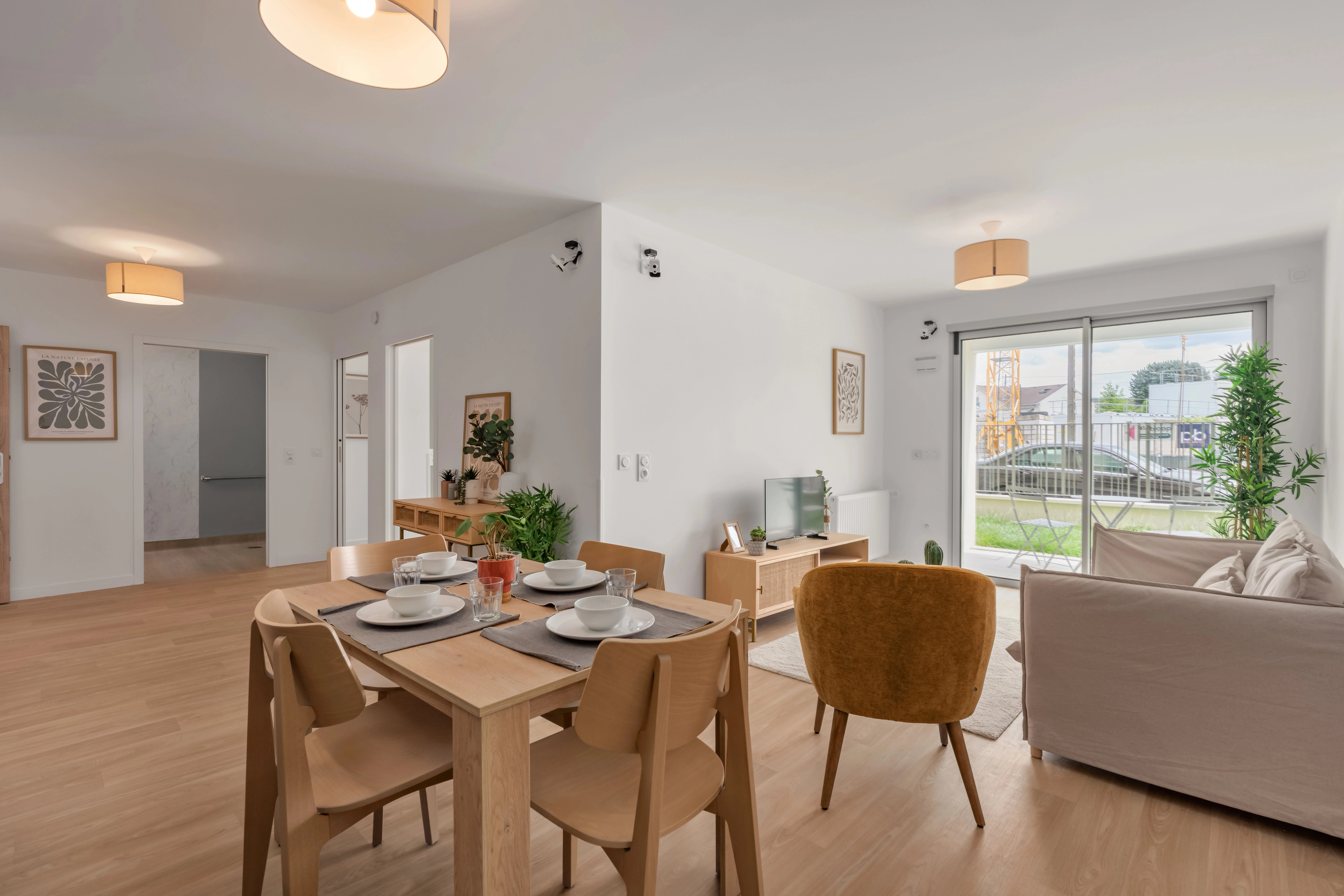 Séjour et coin repas d'un appartement Mobicap à Draveil