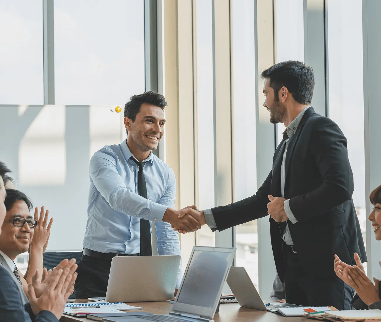 Business meeting handshake – Gallagher Industries Denver office