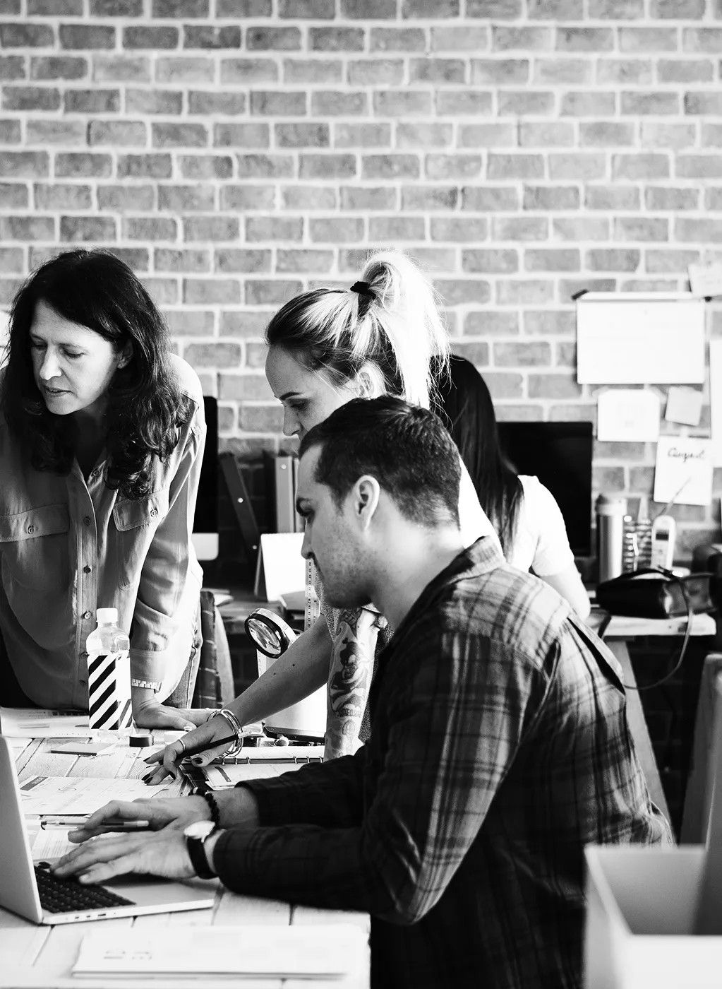 Gallagher Industries team collaborating in an office