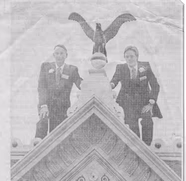 Neil Saunders, on the right, with Phil Saunders, left, atop their corporate headquarters in 1983.
