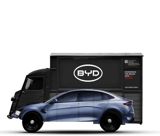 A Black BYD truck with BYD car printed on the side.