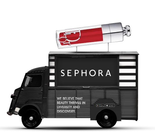 A Black Sephora truck with Lip Gloss on top.