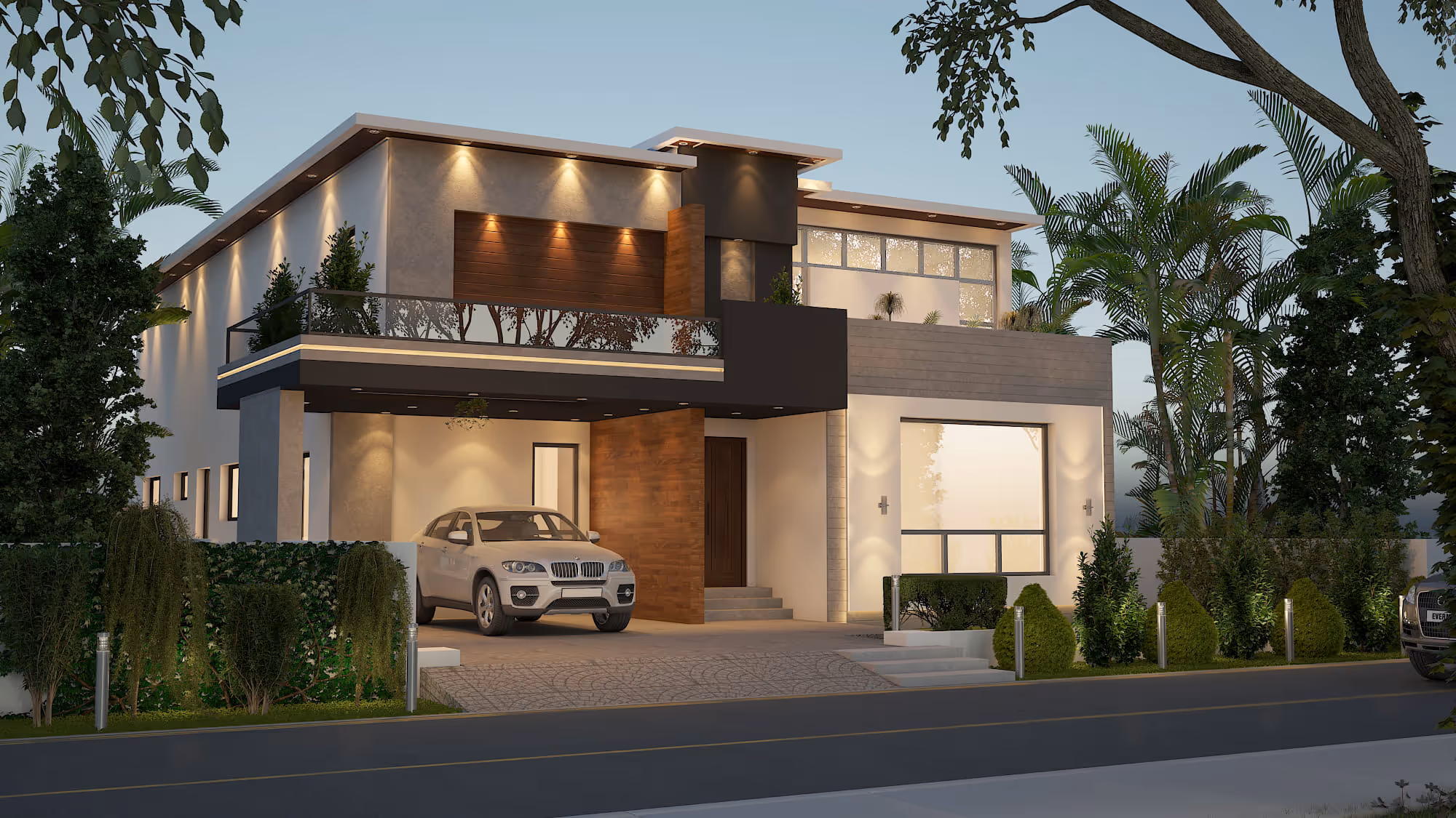 Modern two-story house with large windows, balcony, and a white car parked in the driveway surrounded by lush greenery.