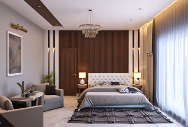 Modern bedroom with a large bed, tufted headboard, dark wood accent wall, chandelier, and seating area by a window with sheer curtains.