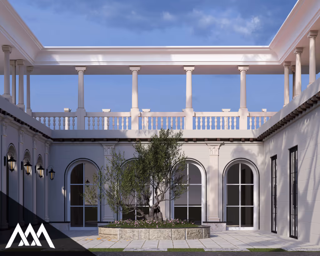 Courtyard with white columns, arched windows, and a central planter with an olive tree and flowers under a clear blue sky.