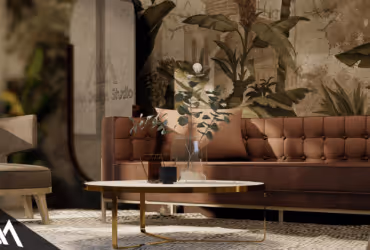 Modern living room with a tufted brown leather sofa, round marble coffee table with glass vases and drinks, textured rug, and botanical wallpaper.