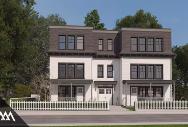 Front view of a modern two-story duplex with white siding, dark window frames, and a white picket fence.