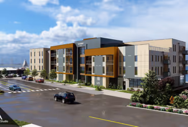 Modern multi-story residential building with balconies, landscaping, and cars parked on the street in front.