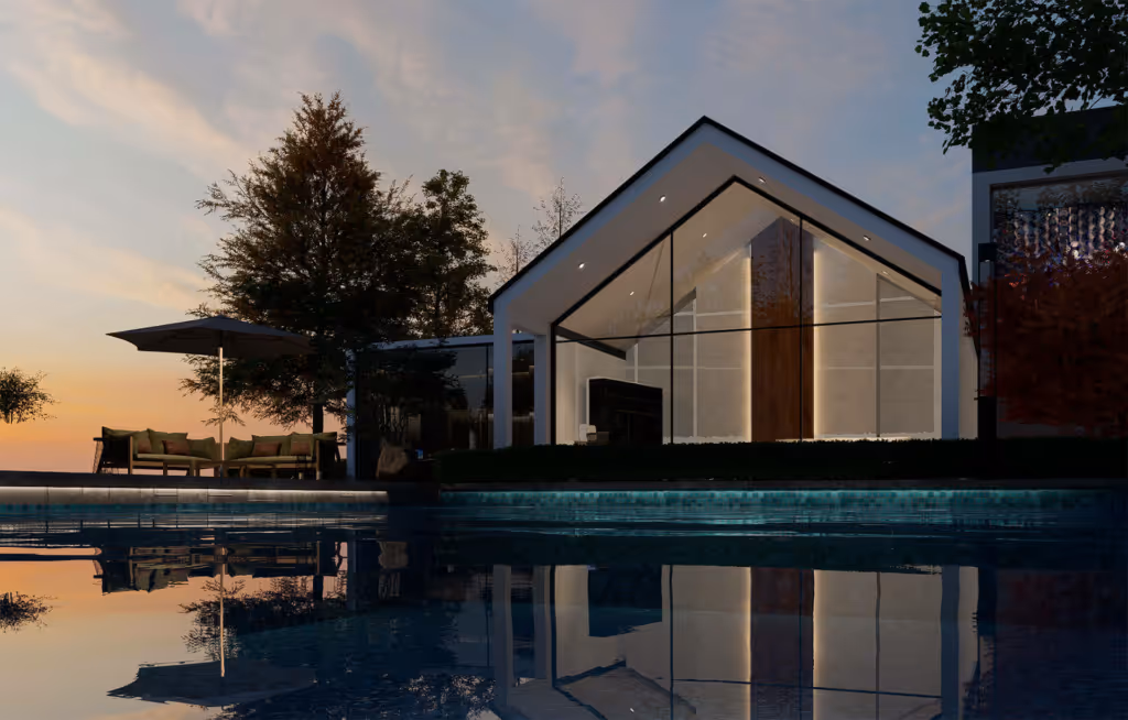 Modern house with large glass walls and warm interior lighting reflected in a pool at dusk, with outdoor seating and trees nearby.
