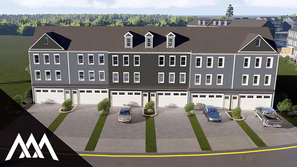 Row of modern three-story townhouses with garages and parked cars in front, surrounded by greenery.