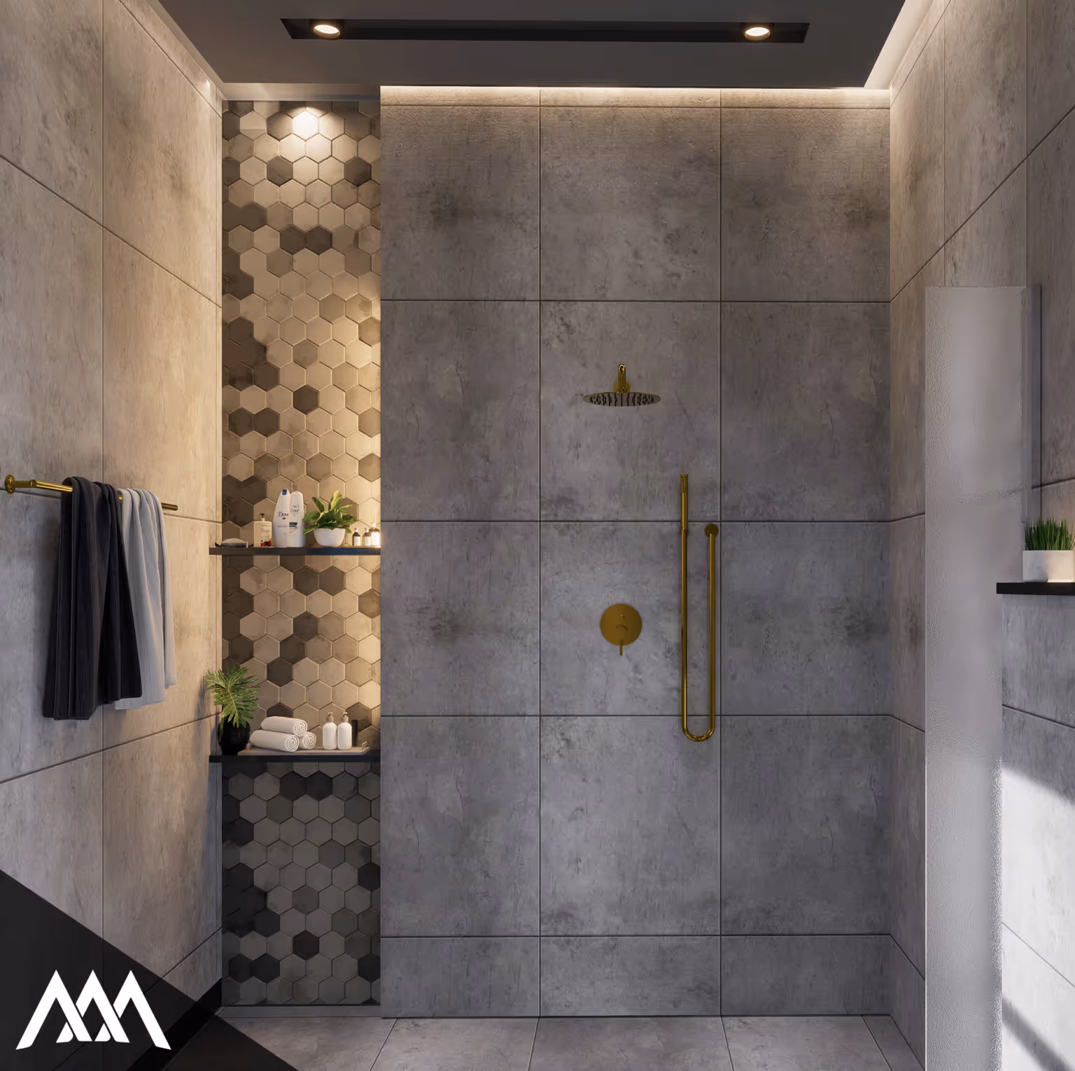 Modern shower area with large gray tiles, gold fixtures, hexagonal patterned shelf with toiletries, and two towels hanging on a gold towel rack.