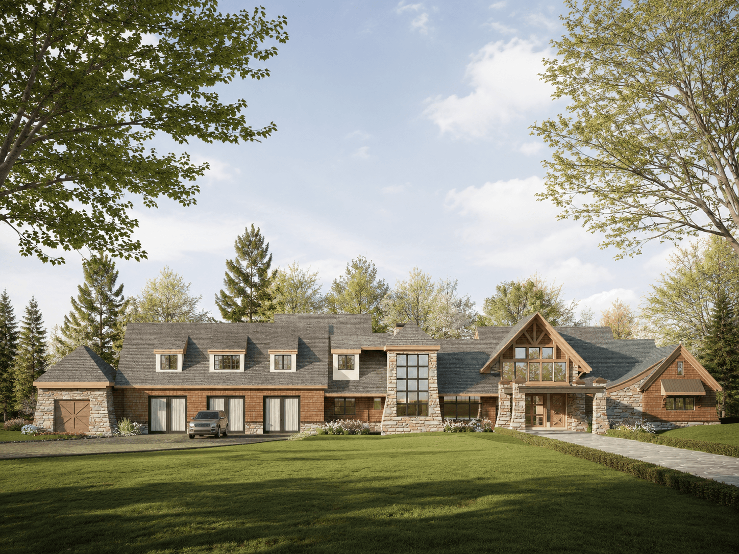 Large stone and wood house with multiple gables, a vehicle in driveway, surrounded by green lawn and tall trees.