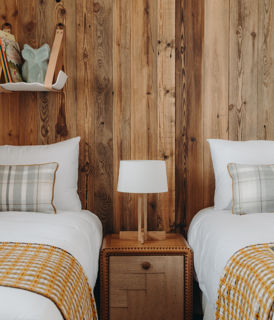 Rustic dining room with exposed beams at the Refuge Chez La Tante — Megève.