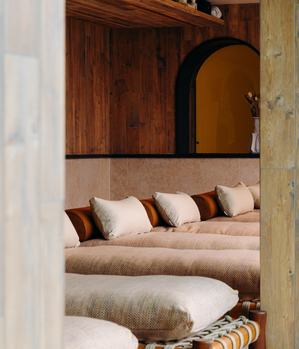 Cups of coffee and a cozy atmosphere on a wooden table at the Refuge Chez La Tante — Megève.