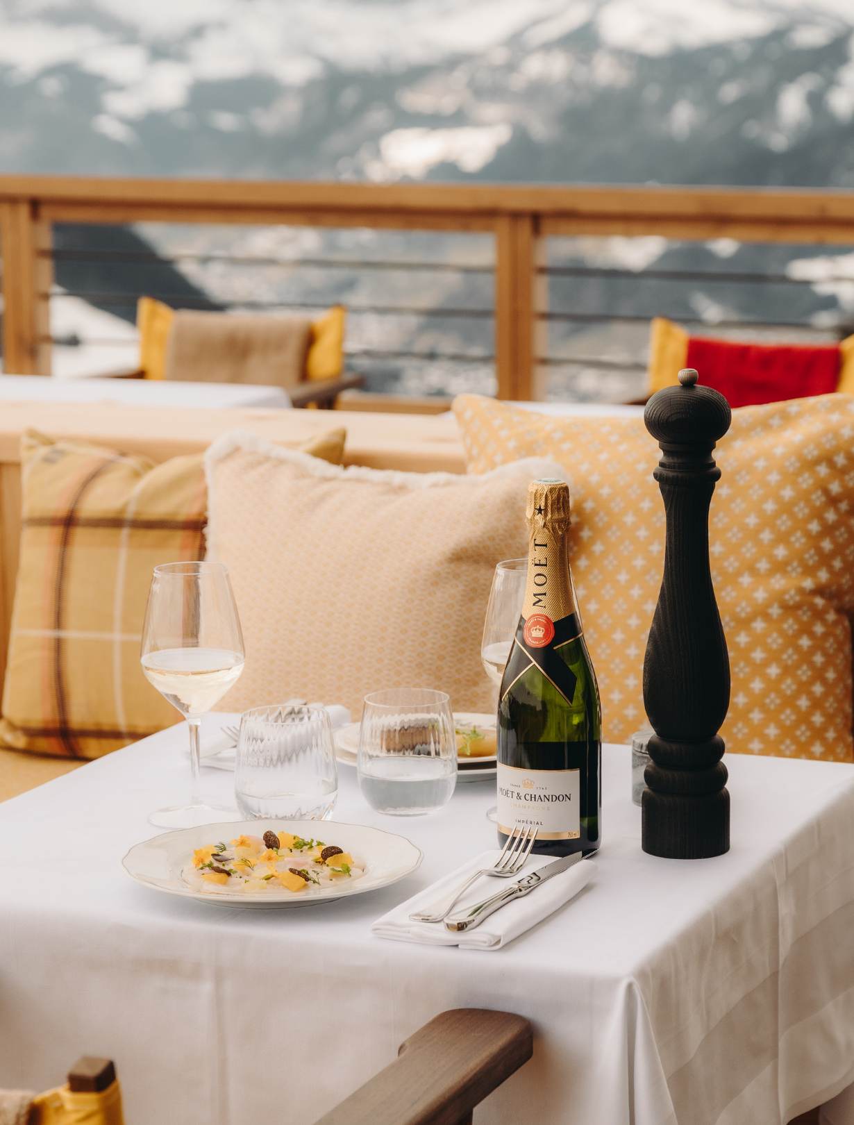 Refined dining room with stone arches at the Refuge Chez La Tante — Megève.