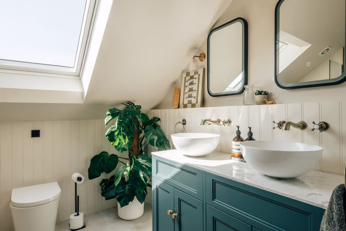 Preview of the Flock Mill Project. A sophisticated bathroom with green vanity unity which contrasts with light walls and ceiling.