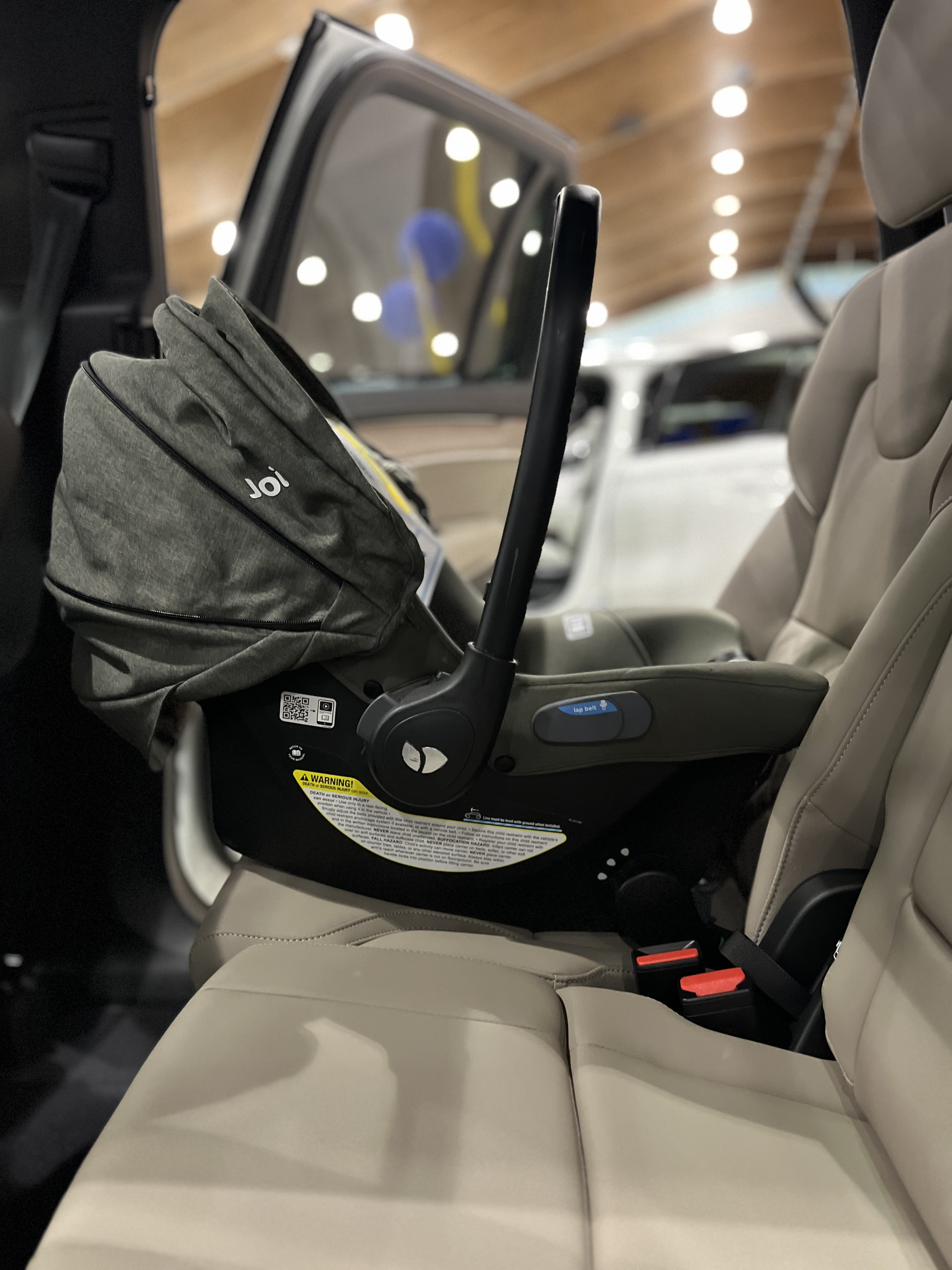 A baseless infant car seat installed