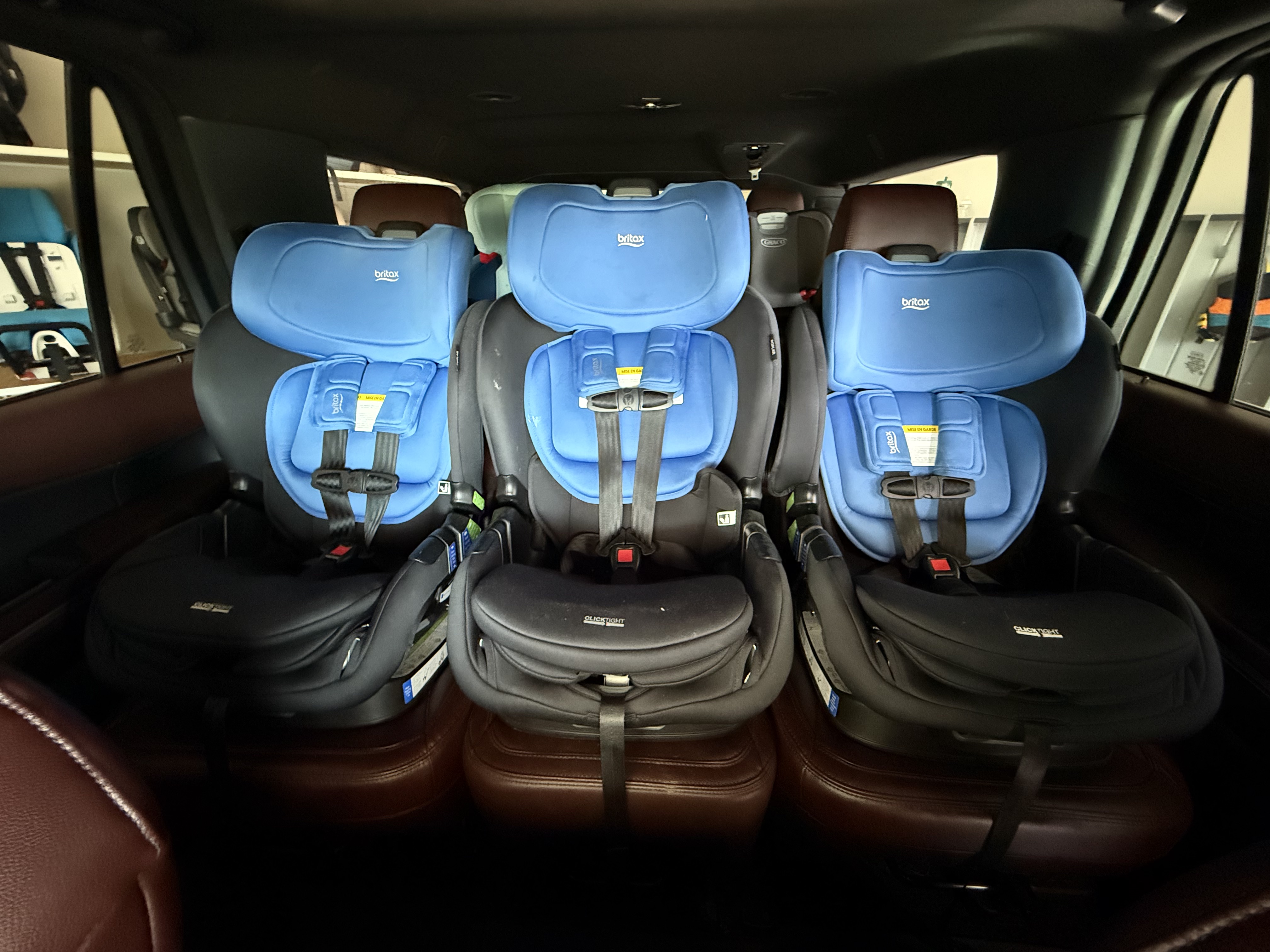 Three Britax Poplar car seats in the second row