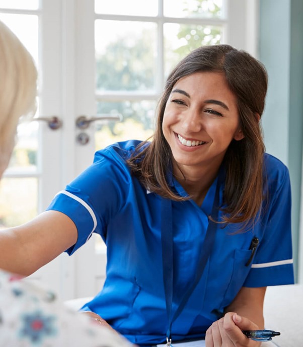 Doctor discussing digestive symptoms and IBS diagnosis with patient