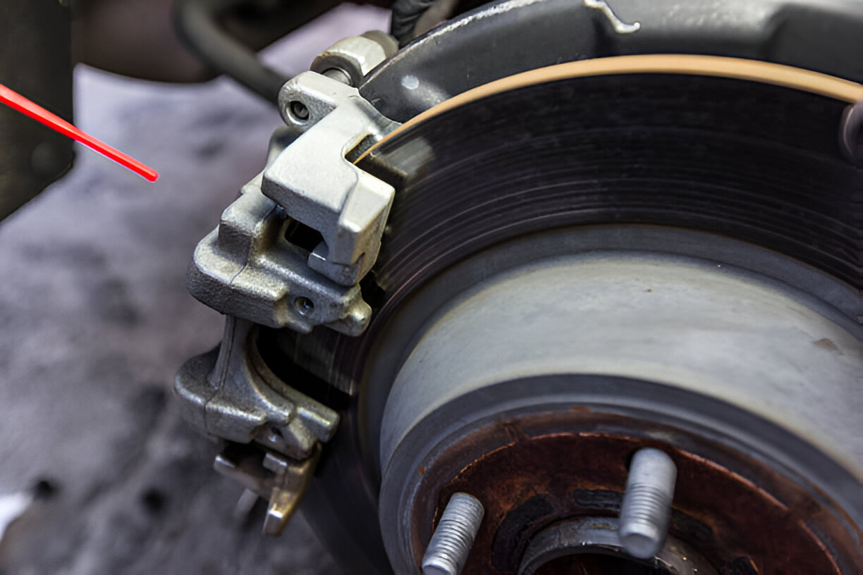 Car brake system with caliper and rotor, close-up view