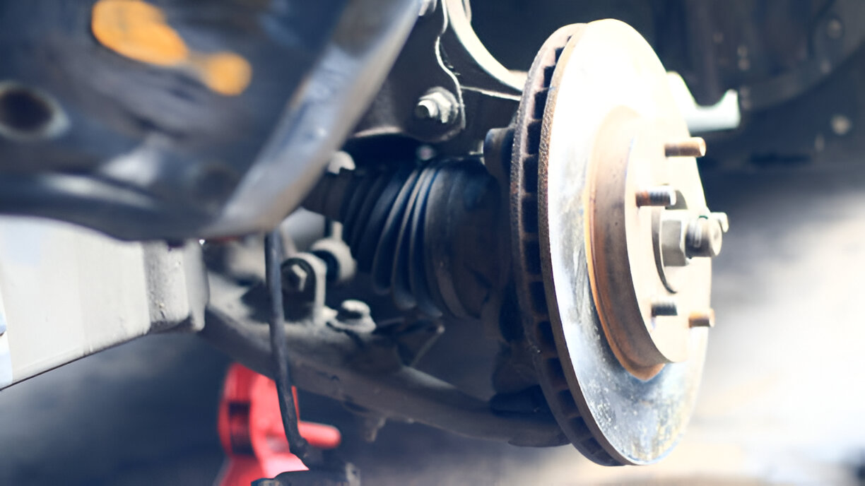 Car brake disc and suspension system close-up view