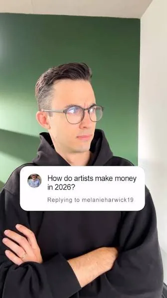 Creator in glasses discussing how artists make money
