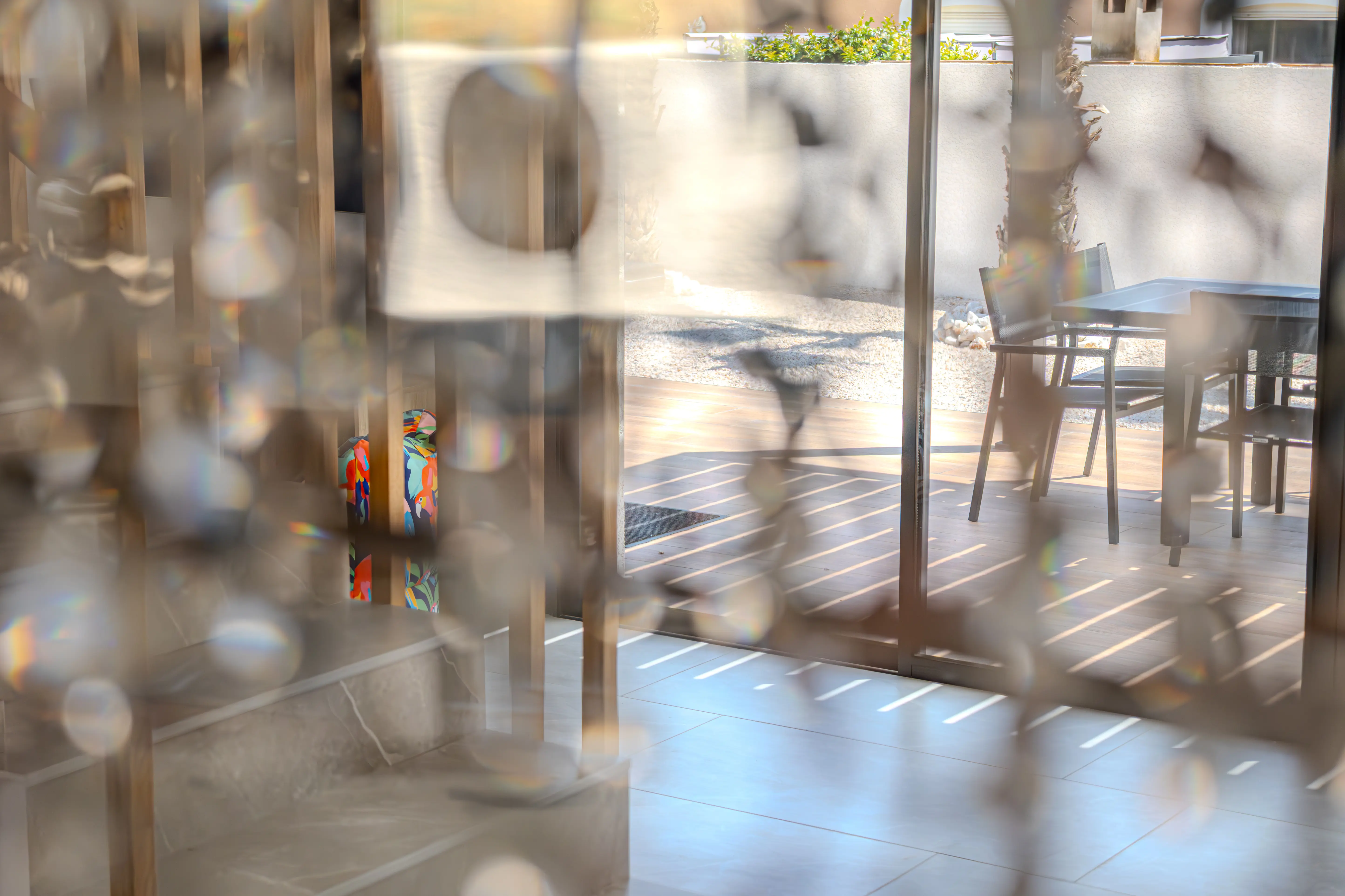 A photo of the ground floor blurred by garlands.