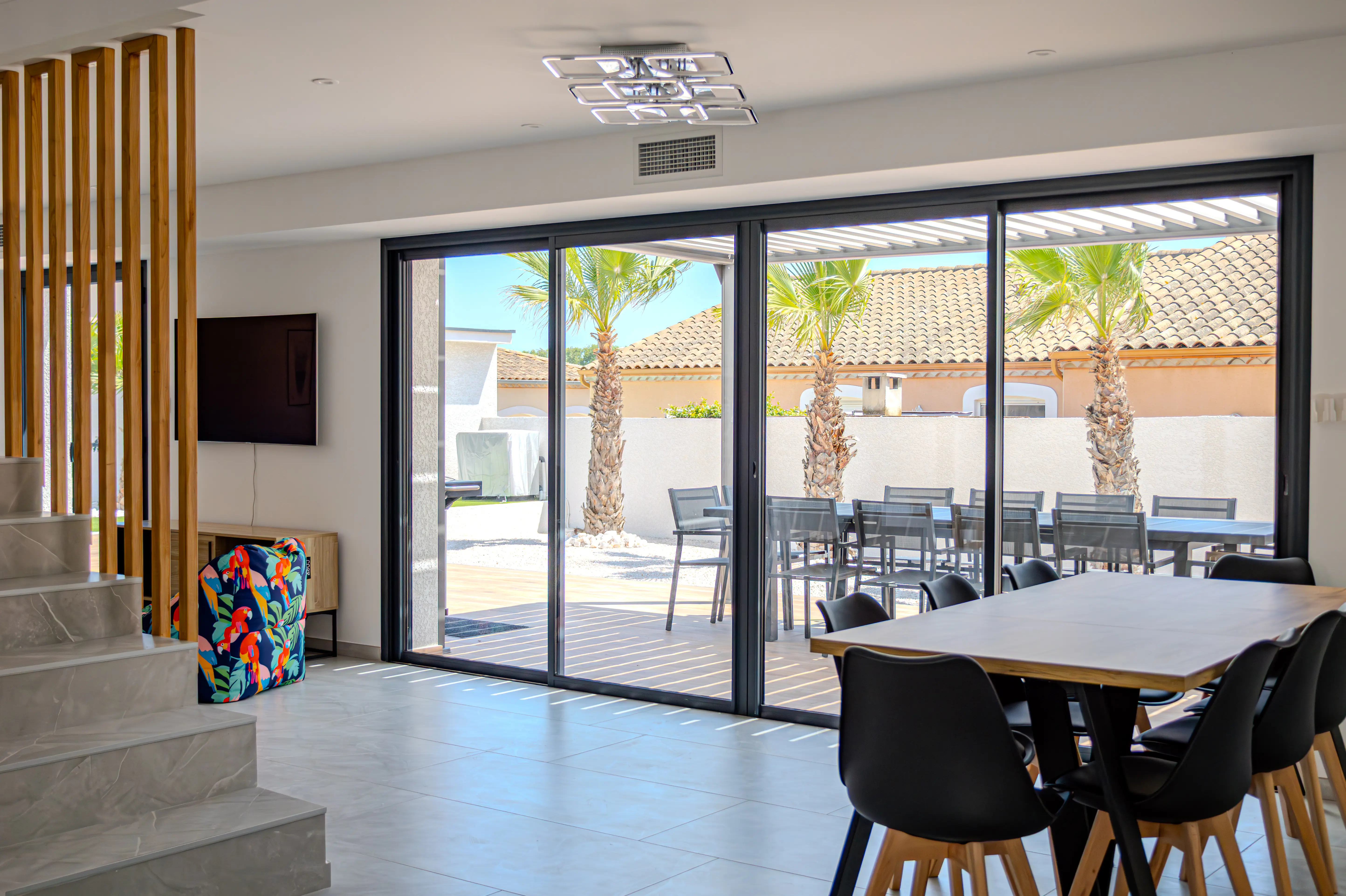 A photo of the interior of Villa Galinier with a view of the exterior.