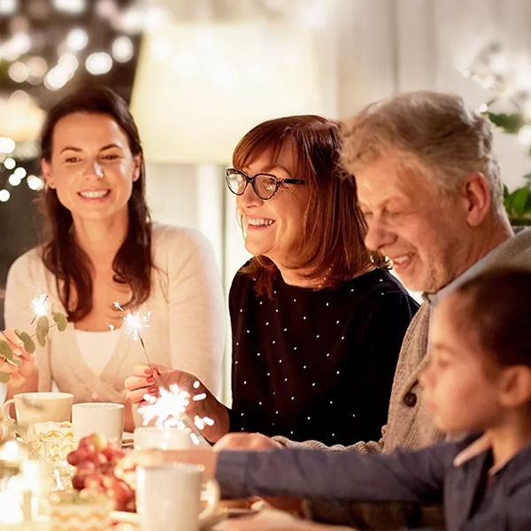 A family celebrating at a restaurant. 