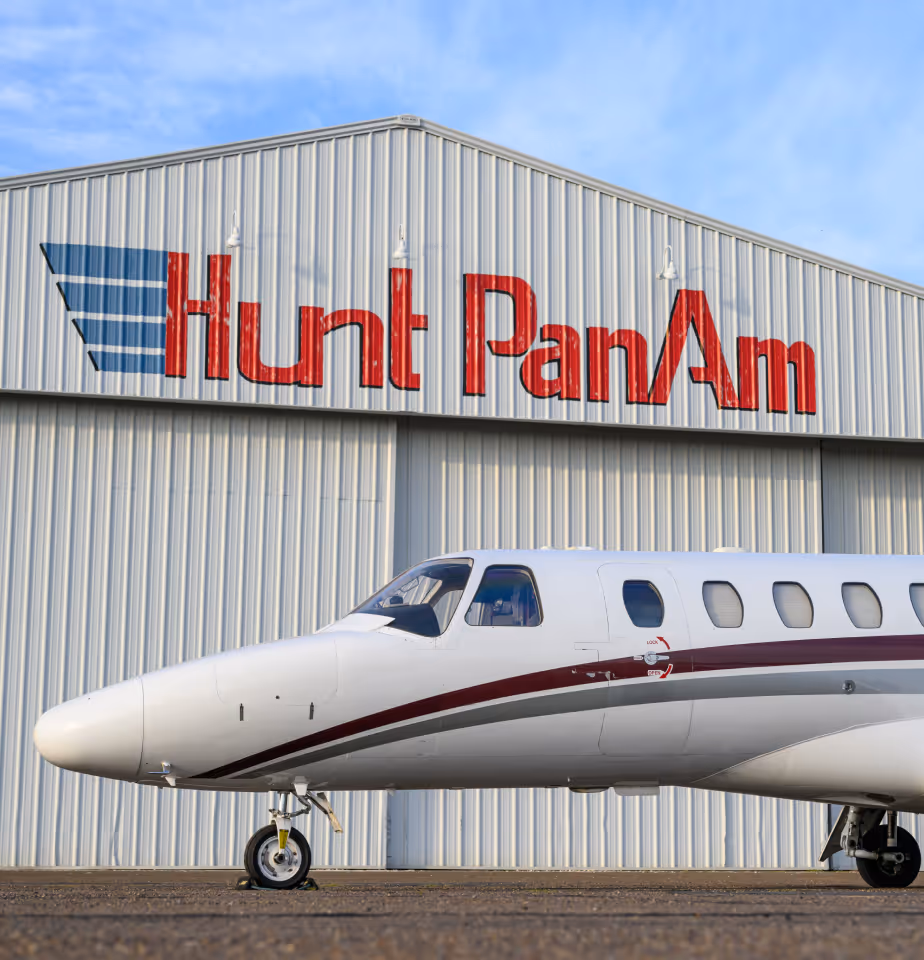 Charter plane parked outside of the Hunt PanAm aircraft hangar.