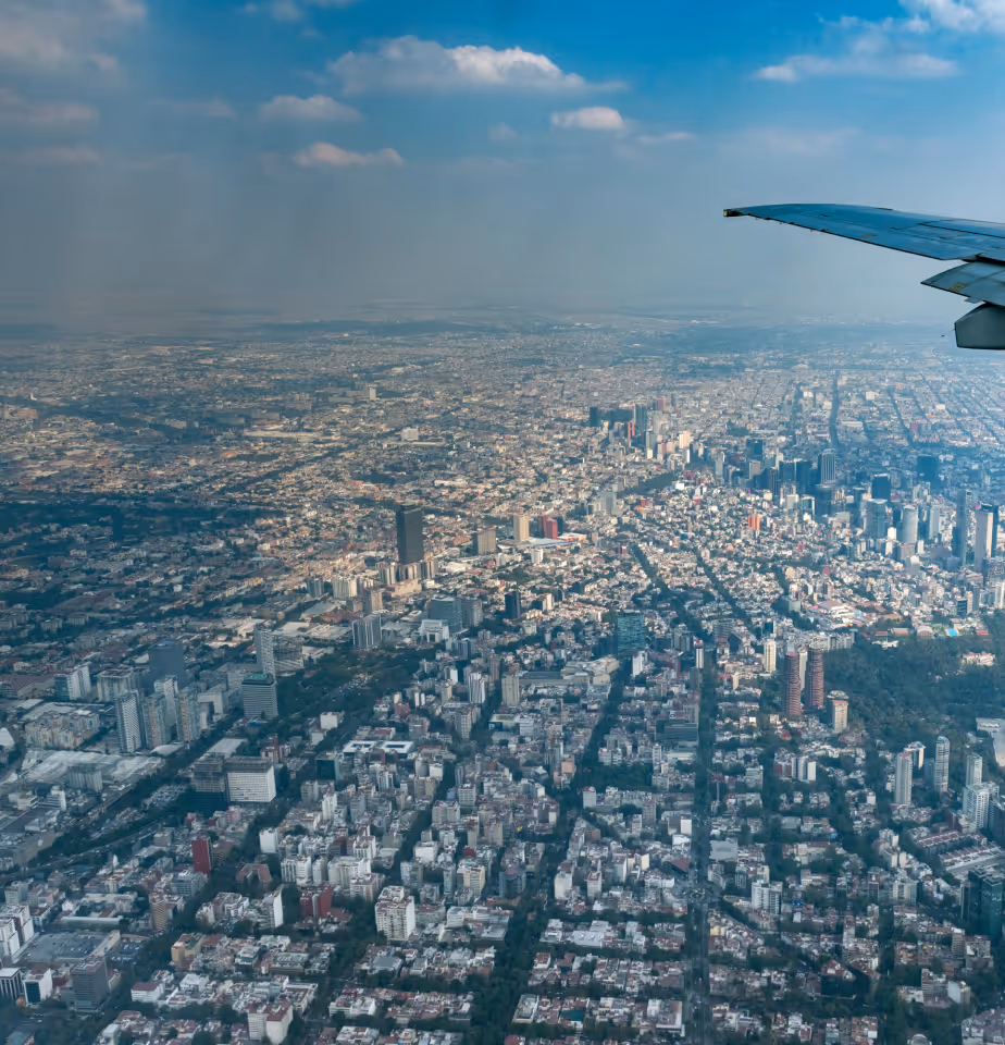 Aerial shot of Mexico City taken from airplane window. 