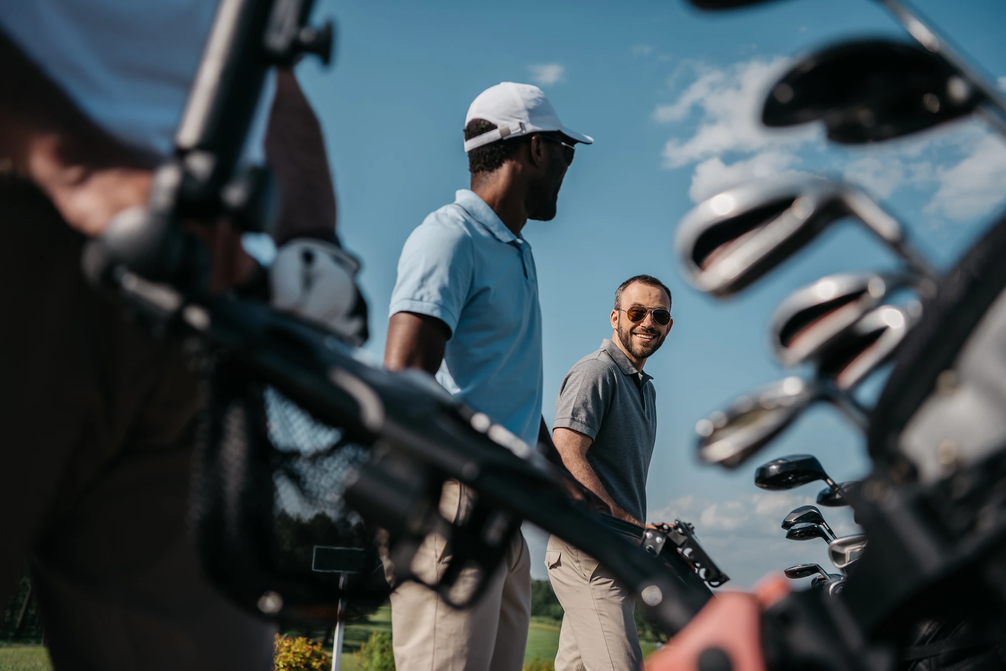 smiling golf players