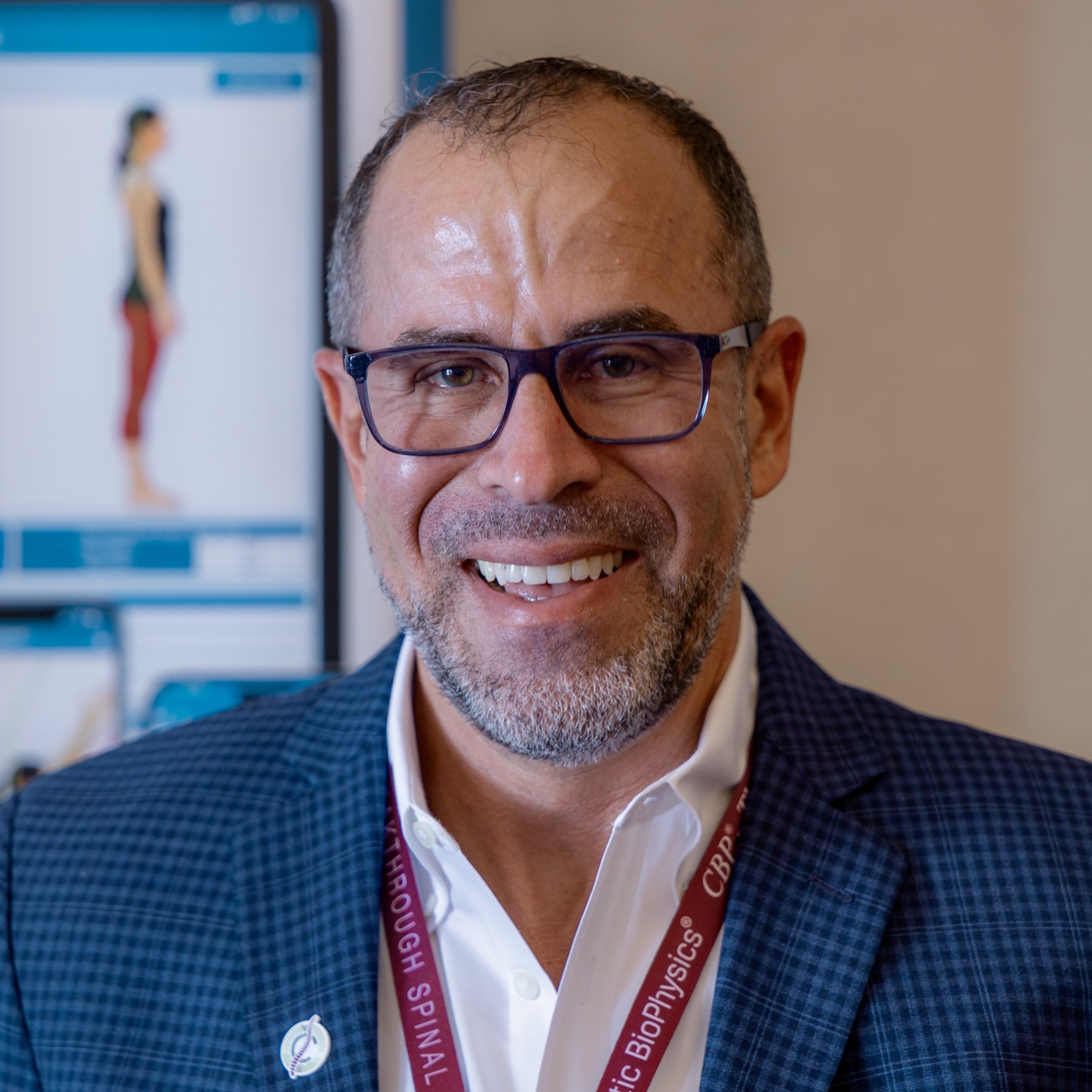 Headshot of Built founder & CEO, Nick Greer, smiling, featured alongside a customer testimonial about RapidTalk AI’s impact on customer response times.
