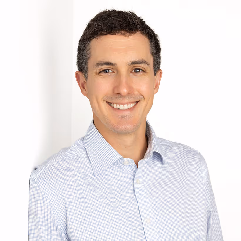 Professional headshot of Andrew Slusser