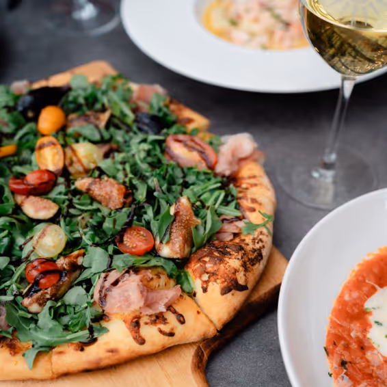 Close up of pizza on a table.