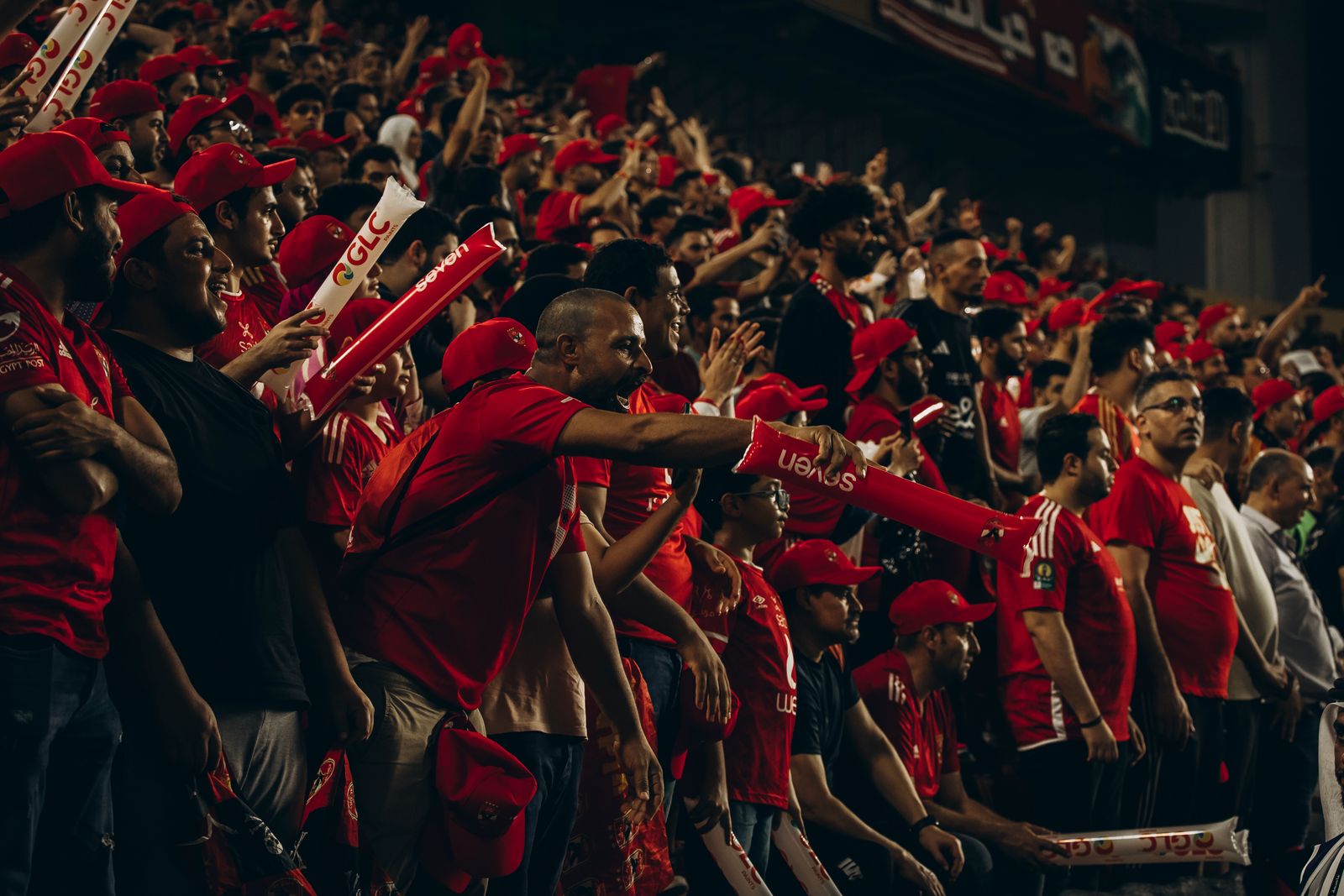 Football fans cheering in a stadium