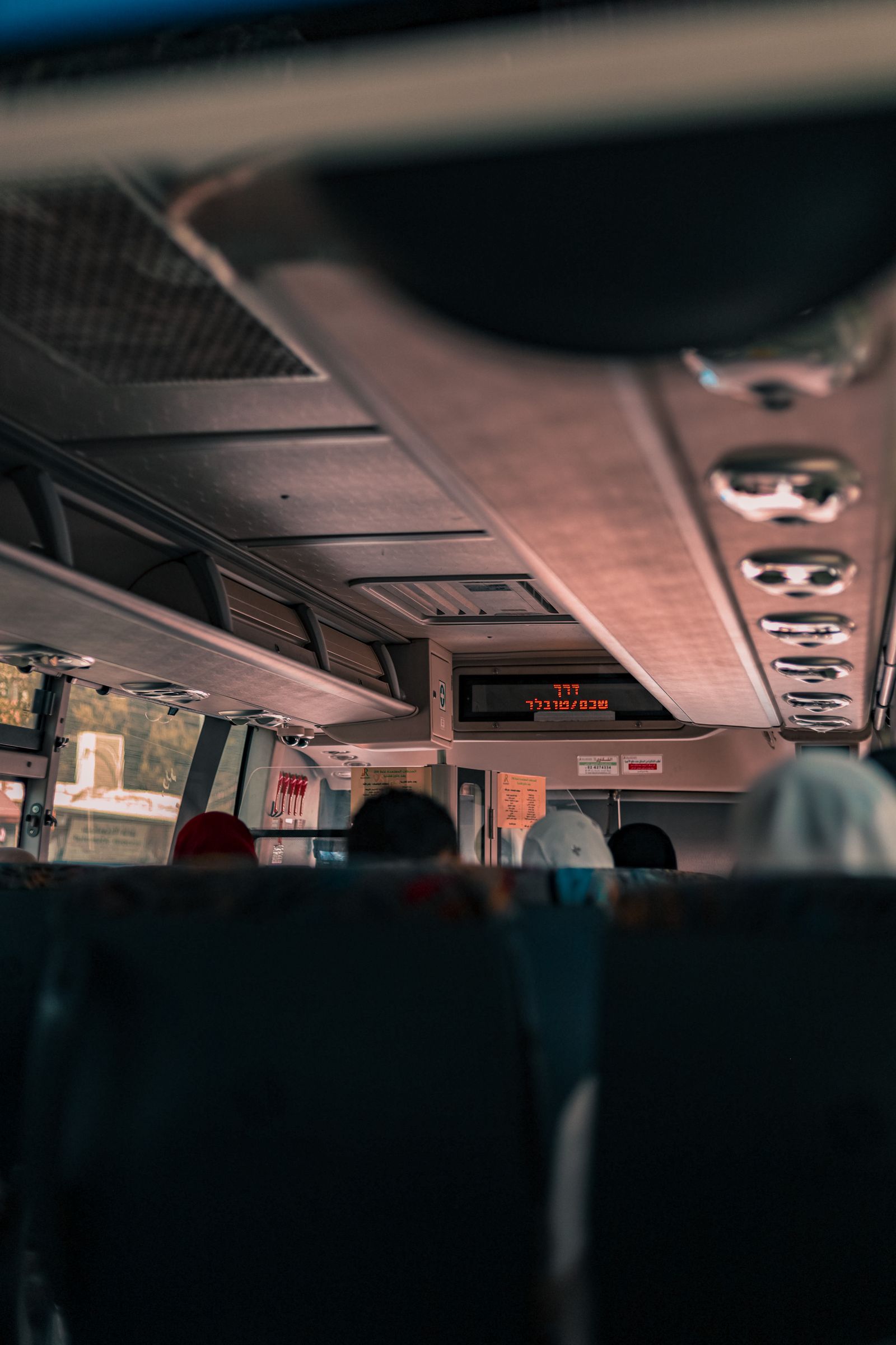 Interior of a charter bus with passenger seats