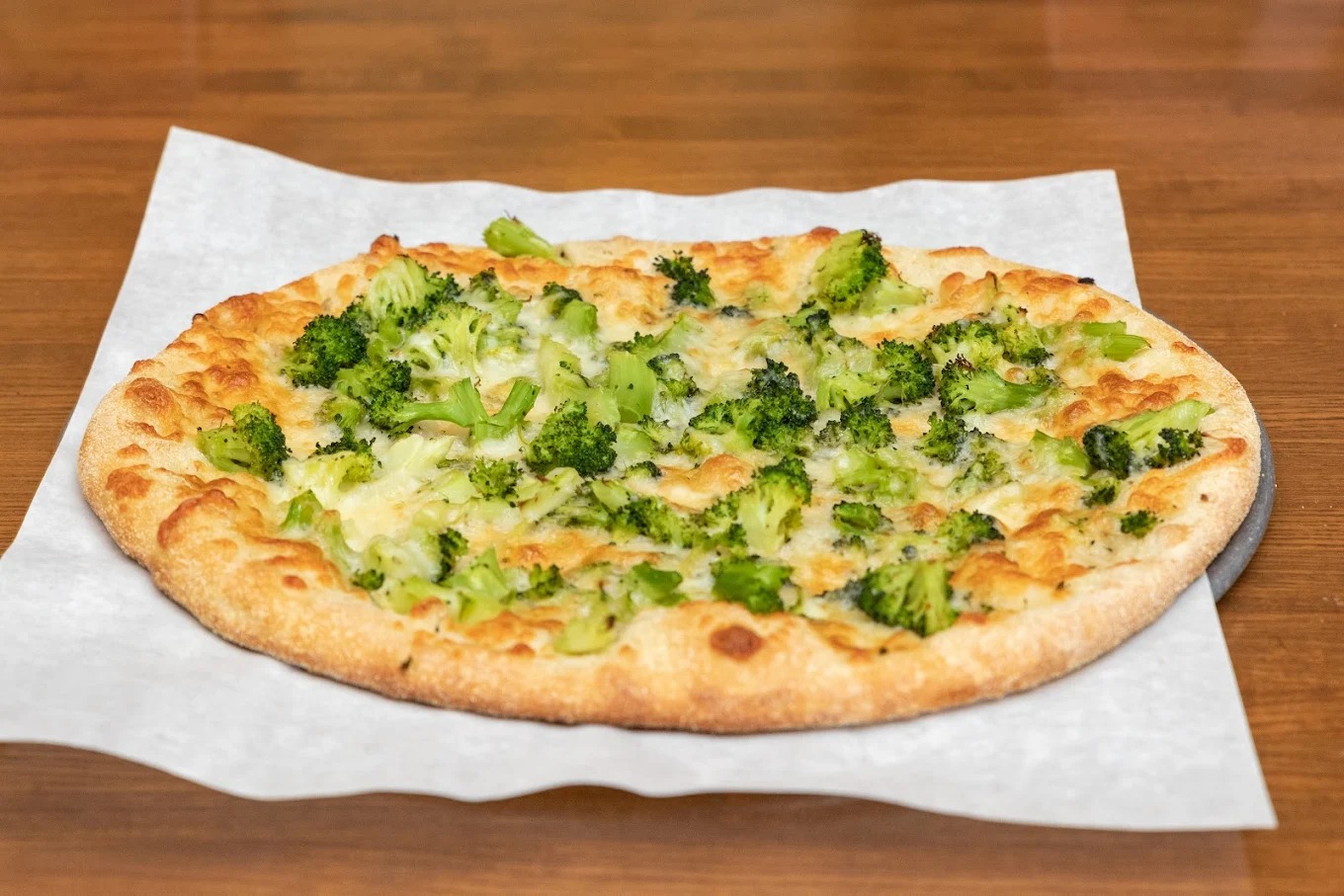 Broccoli cheese pizza