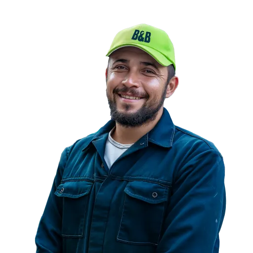 A man with a beard wearing a green B&B hat.