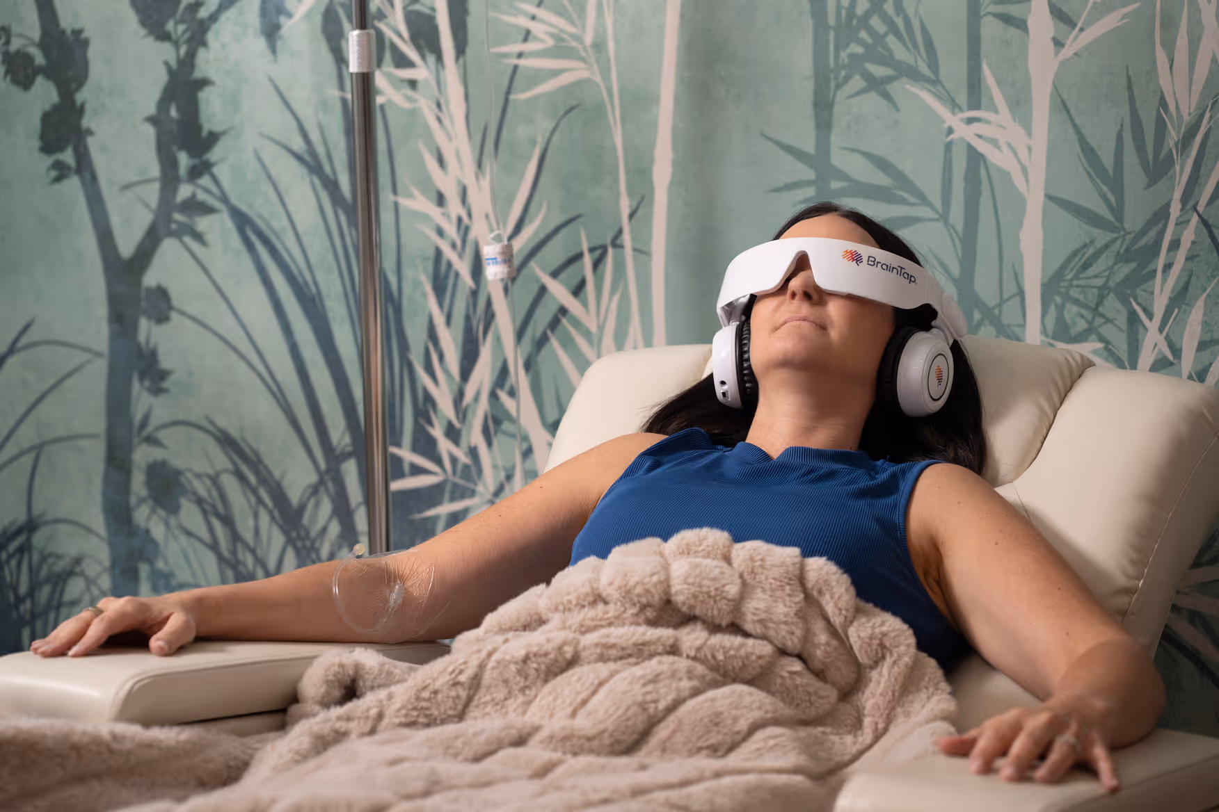 BrainTap relaxation headset during IV therapy at Nova Wellness Roseland NJ