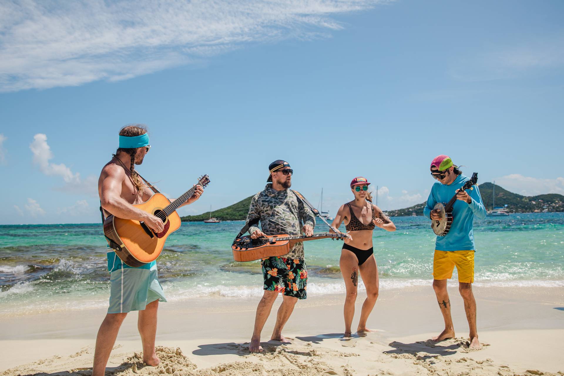 Musicians playing music on a tropical beach