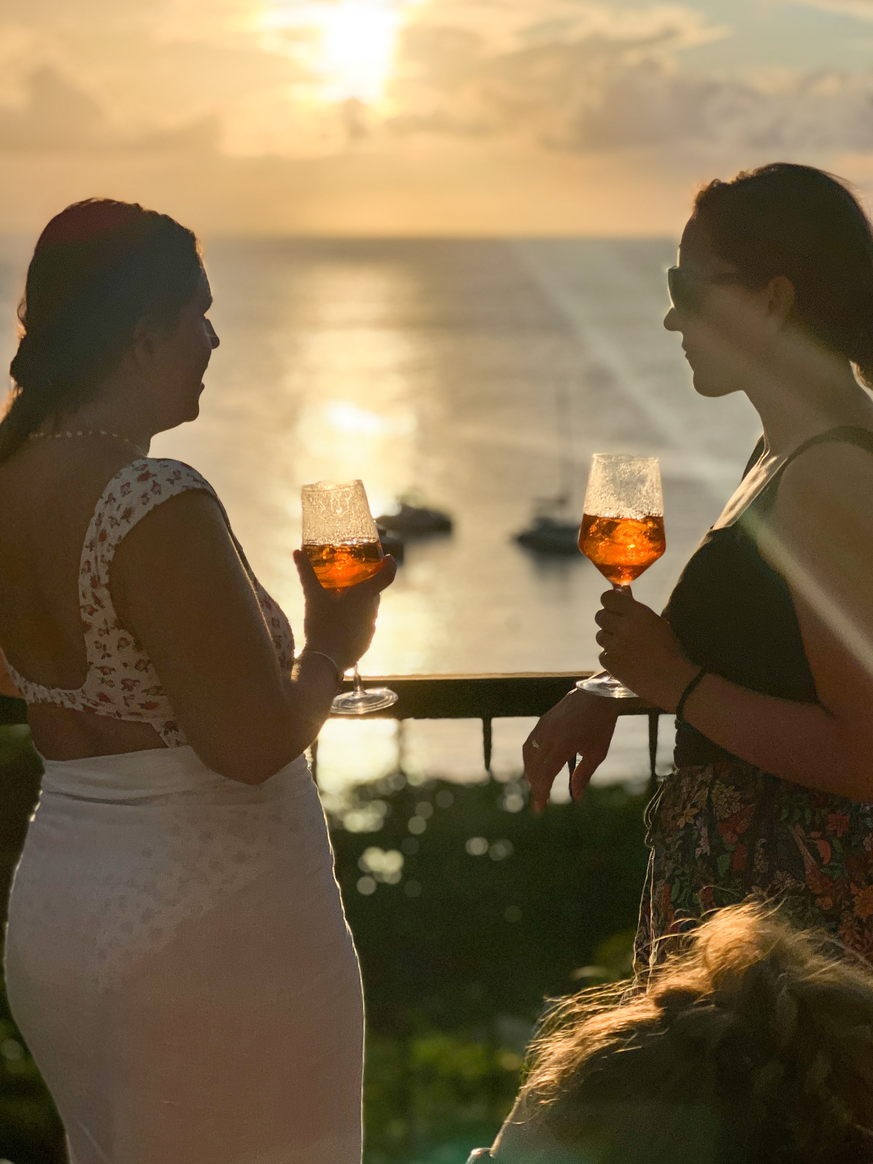 Friends enjoying cocktails in Mustique