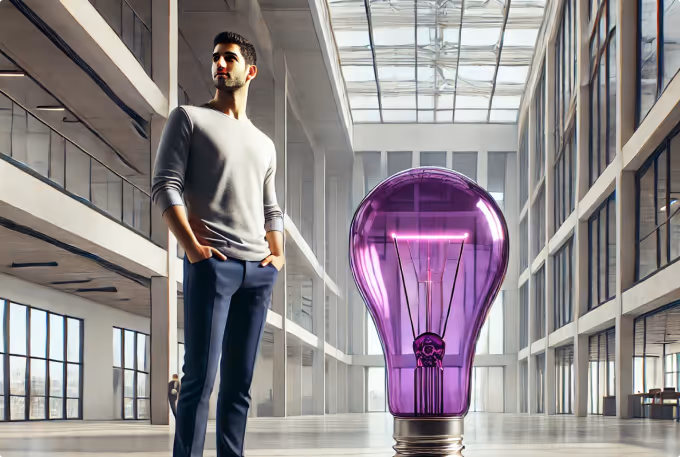Man with purple lightbulb idea